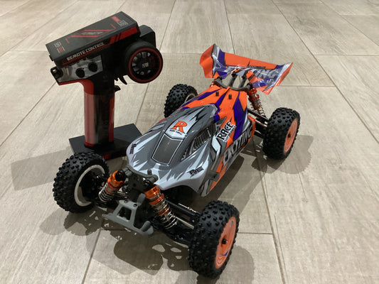 Buggy Wltoys Naranja 4x4 escala 1/12