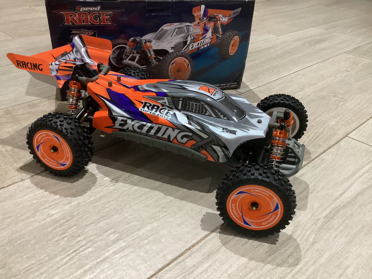 Buggy Wltoys Naranja 4x4 escala 1/12