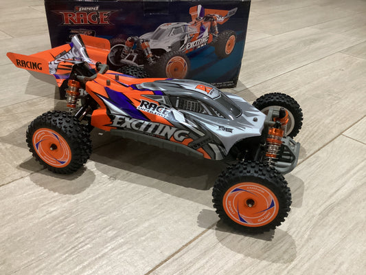 Buggy Wltoys Naranja 4x4 escala 1/12